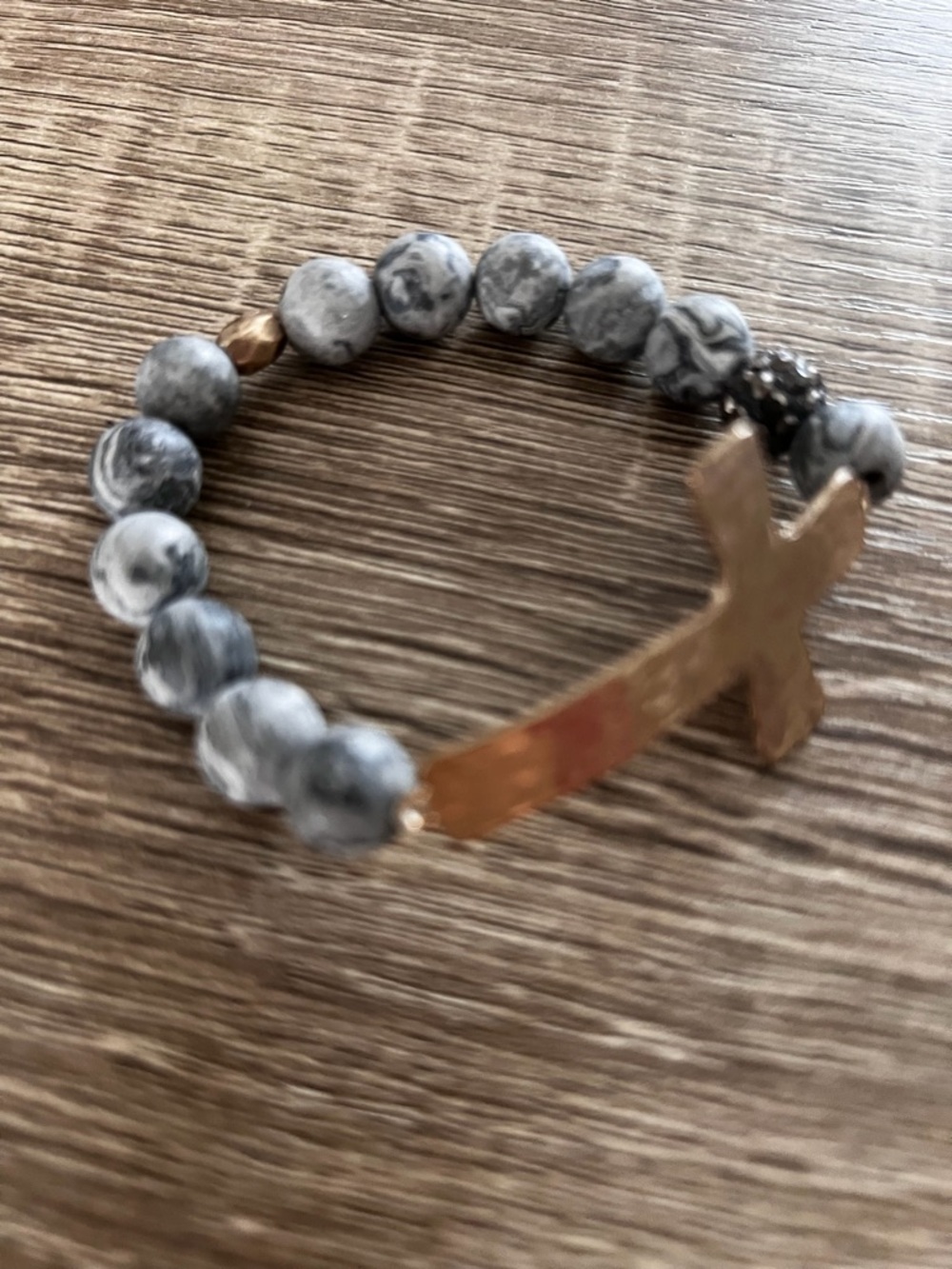 Gold Cross Stretch Bracelet with Gray Marble Beads
